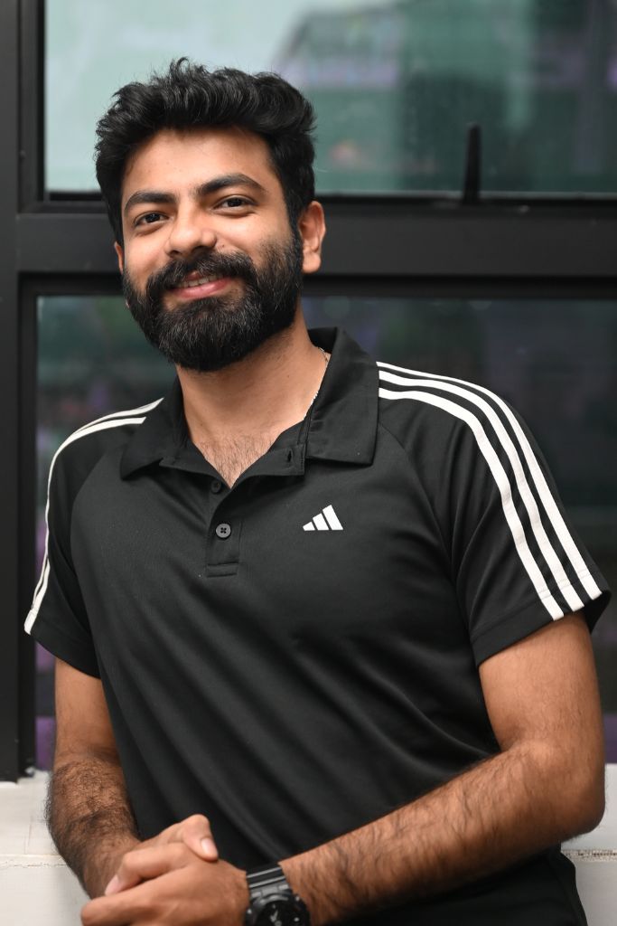 A headshot image of Ujesh.